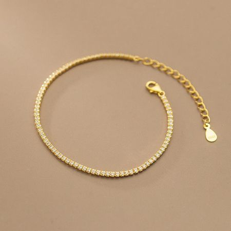 The 2mm cubic zirconia tennis bracelet in a luxurious gold finish, showing the clasp detail.