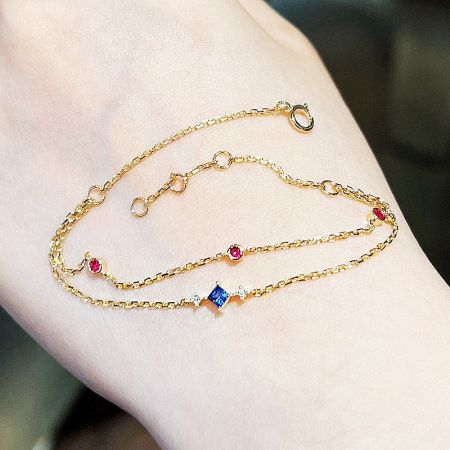 A model wearing the 925 sterling silver gemstone bracelet to show scale.