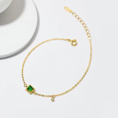 Close-up of the bracelet clasp and extension chain, showing the fine craftsmanship.