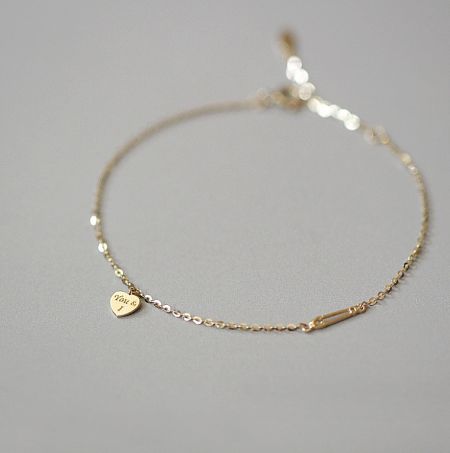 925 Sterling Silver Heart Gold Plated Bracelet - Close-up of the 925 Sterling Silver Heart Gold Plated Bracelet, highlighting the detailed heart charm with 'You & I' engraving and its polished gold finish.