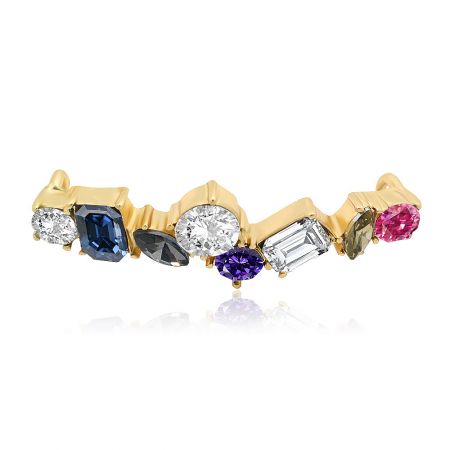 Close-up of the gold-plated shoe charm with a variety of colorful glass and crystal fittings.