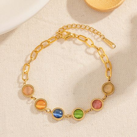 A stylish gold chain bracelet featuring an array of vibrant multicolored gemstones.