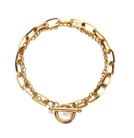 Double Chain Toggle Bracelet - Stylish Double Chain Toggle Bracelet in gold-plated stainless steel, featuring interlocking oval links and a secure toggle clasp.