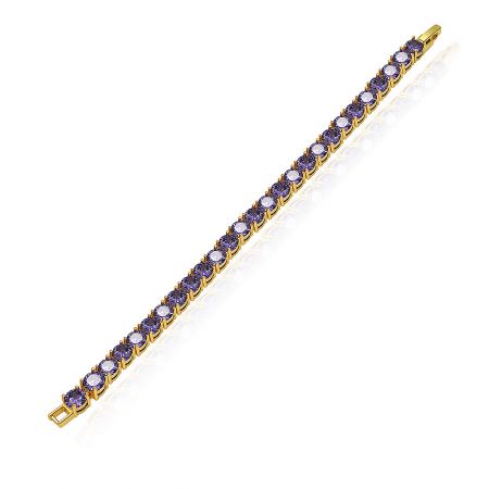 Detailed view of the gold tennis bracelet's clasp and the intricate prong setting of its purple and clear gemstones.