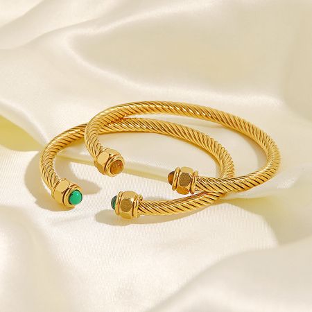 Stainless Steel Nature Stone Twist Pave Open Cuff Bangles (Set of 5) - A set of two stainless steel open cuff bangles with a twisted design, one with green and one with brown natural stone accents, displayed on a neutral background.