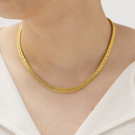 Stainless Steel Tarnish-Free Gold Chunky Twisted Rope Chain Necklaces (Set of 5) - A close-up of a tarnish-free, gold-plated chunky twisted rope chain necklace made from stainless steel, displayed on a neutral background.