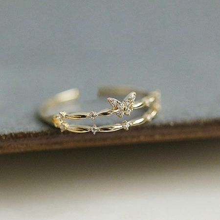 The butterfly ring design featuring delicate gemstone embellishments for extra sparkle.