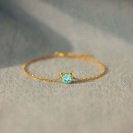 Another angle of the minimalist cat face bracelet, emphasizing its delicate and charming design.