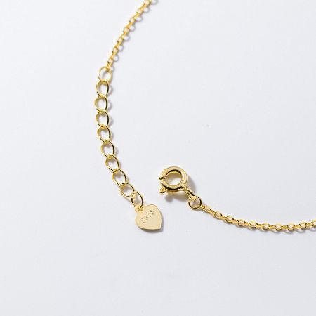 Back view of the heart pendant showing the S925 sterling silver quality stamp.