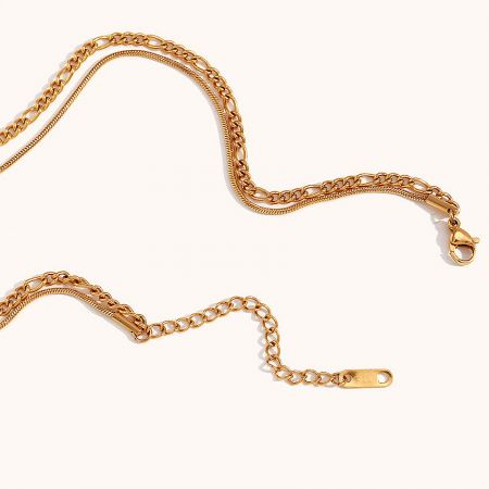 The layered gold necklace shown with a matching bracelet.