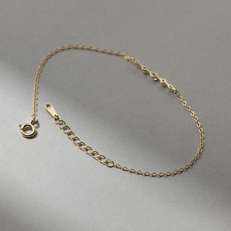 Detail of the secure clasp and extension chain on the sterling silver bracelet.