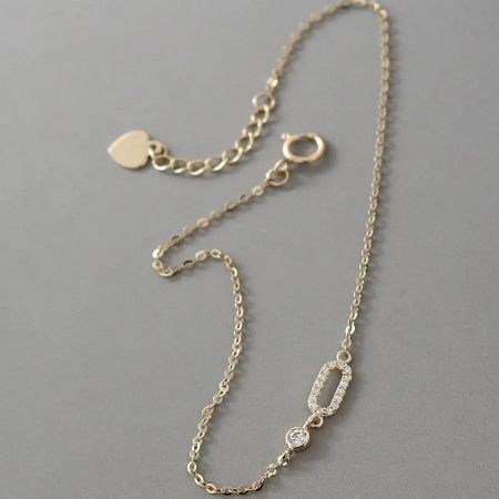 Elegant 925 sterling silver and CZ bracelet with baguette-cut stones, perfect for stacking.