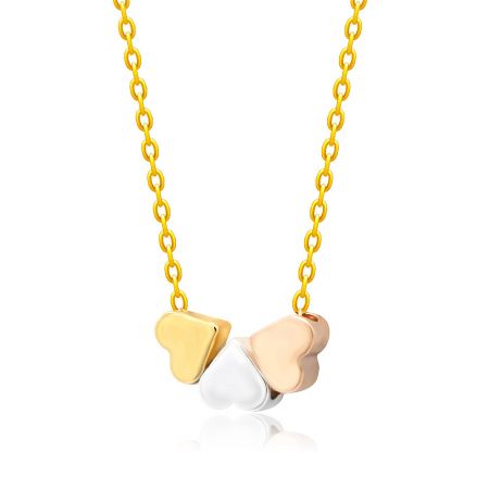 The Triple Heart Necklace displayed to show its length and clasp detail.