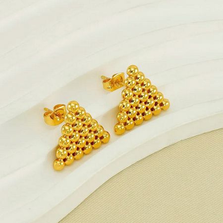 A festive Christmas tree shaped variation of the gold beaded earrings.