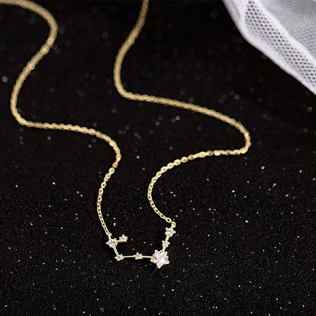 The constellation necklace in a luxurious gold finish, showcasing its detailed craftsmanship.