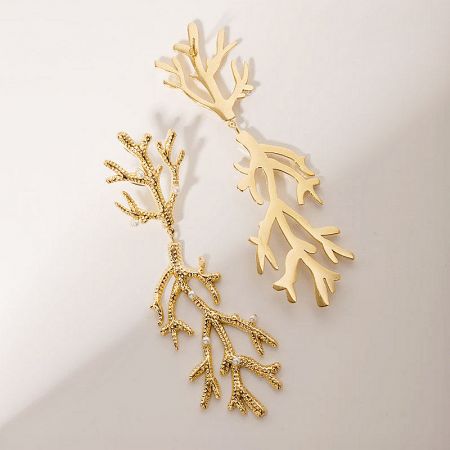 Studio shot of the gold coral branch drop earrings.