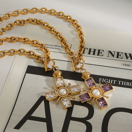 A close-up of the amethyst purple crystal and pearl cross choker necklace, highlighting its Y2K style.