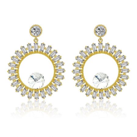 Cute CZ Round Hollow Piercing Jewelry Designer Earrings - A pair of Cute CZ Round Hollow Piercing Designer Earrings, featuring a gold-plated circular design with a large central cubic zirconia crystal.