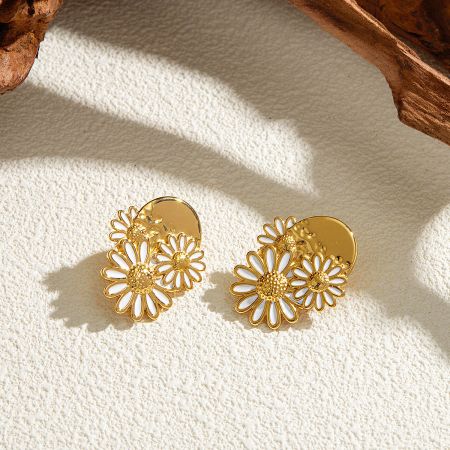 Promotional image of the gold sunflower and daisy stud earrings.