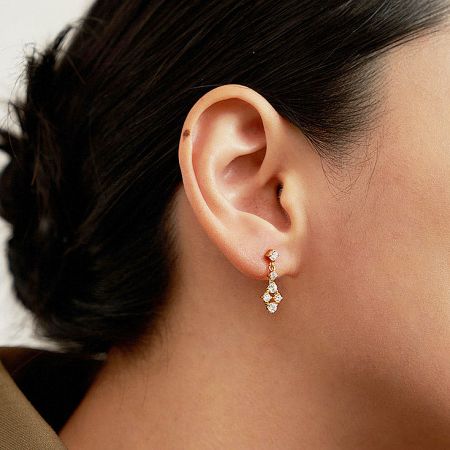 Elegant 18k gold plated drop earring featuring three brilliant cubic zirconia gemstones.