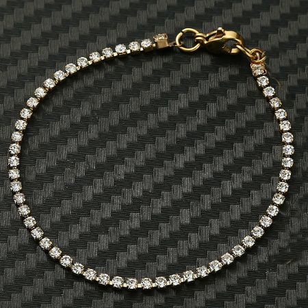 View of the secure and easy-to-use lobster clasp on the gold tennis bracelet.