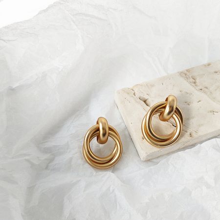 Matte Gold-Plated Geometric Knot Cord Stud Earrings (5 Pairs) - A pair of matte gold-plated geometric knot cord stud earrings with a distinctive double-ring design, on a clean white background.