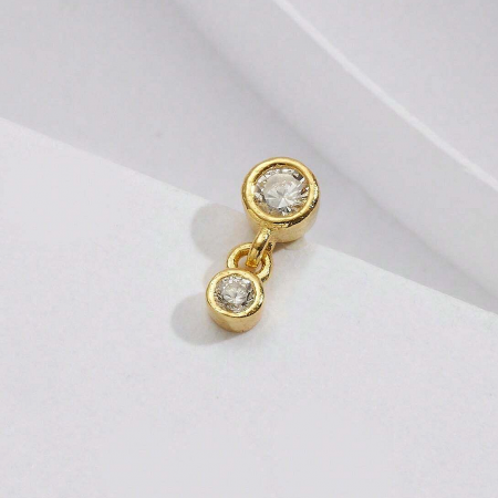 Gold-plated version of the two-stone cubic zirconia stud earrings.