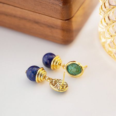 A stylish pair of earrings showcasing the contrast between deep blue lapis lazuli and vivid green malachite gemstones.