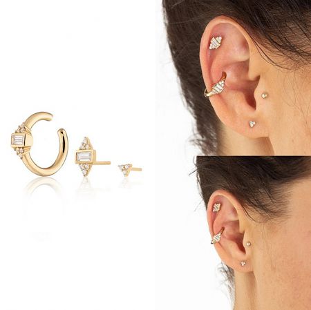 Detailed view of the gold-plated cartilage earring set with cubic zirconia.