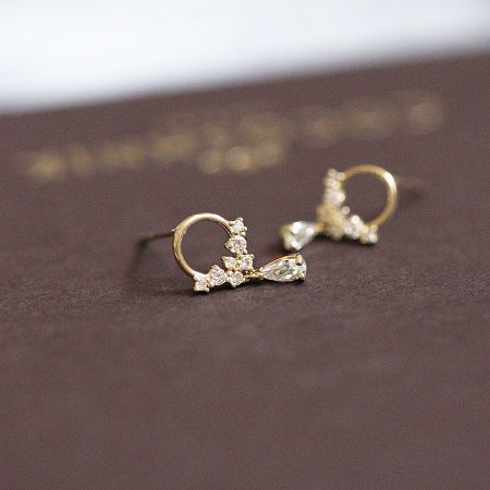 Front view of the 925 silver gold zircon teardrop hoop earrings, showcasing the brilliant gemstones.