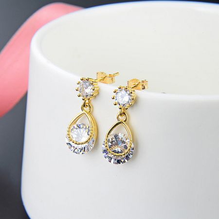 Another perspective of the elegant gold teardrop earrings, emphasizing the combination of teardrop and round zirconia stones.