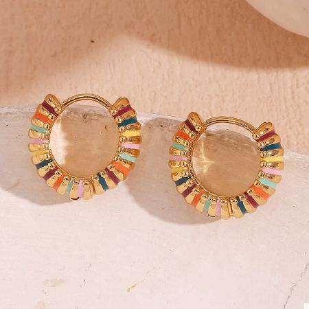 A pair of gold-plated chunky hoop earrings with colorful enamel stripes, showing the hinged back closure.