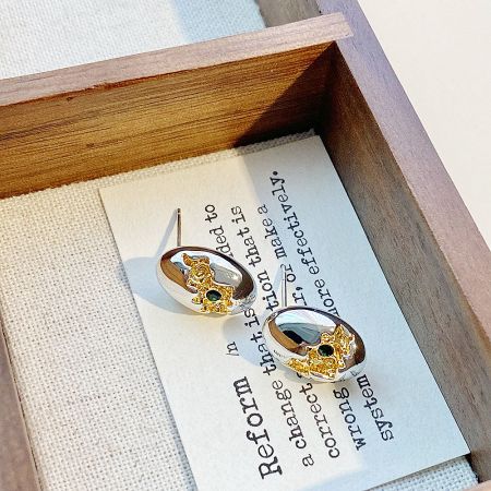 Two-Tone Green Gemstone Teardrop & Oval Stud Earrings (Set of 5 Pairs) - A pair of two-tone stud earrings with a vibrant green gemstone, elegantly displayed in a wooden presentation box.