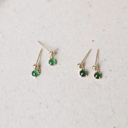 Two pairs of the classic 925 sterling silver jade earrings, showcasing the consistency of the wholesale set.