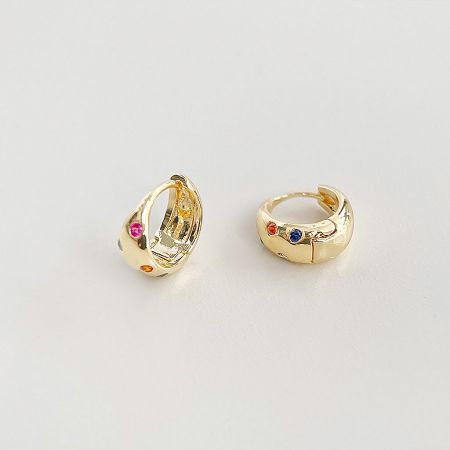 A pair of gold earrings with multicolored gemstones, showcasing their brilliant shine and craftsmanship from another angle.