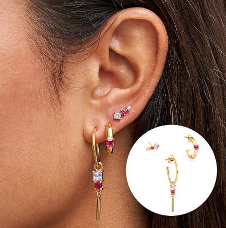 Close-up view of the Pink Hoop Drop Earrings set, highlighting the vibrant red and white cubic zirconia gemstones on gold-plated brass.