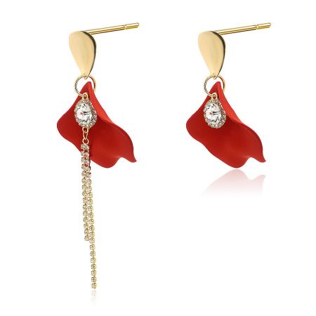 Detailed view of the asymmetrical design of the rose petal earrings, showing the long gold chain and gemstone setting.