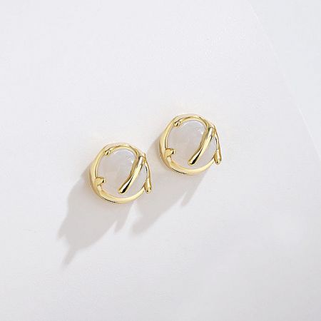 Detailed shot of the gold-plated 925 sterling silver stud earrings with a central white agate stone.