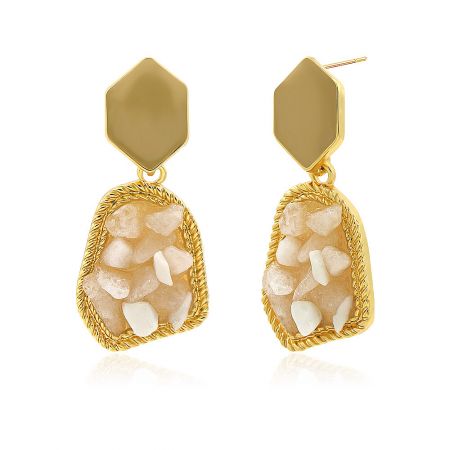 Detailed view of the gold-plated raw stone earrings showcasing the beige epoxy and crystal details.