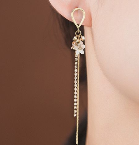 Close-up view of the Three Tone Flower Long Drop Earring being worn to showcase its scale and design.