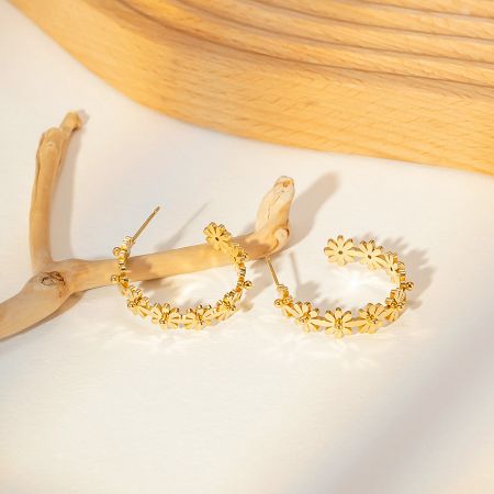 Product shot of the stainless steel gold flower earrings from a slightly different angle.