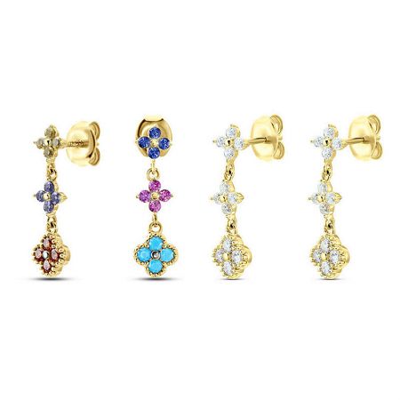A collection of four pairs of gold floral earrings with sparkling gemstones, showcasing the set's variety.