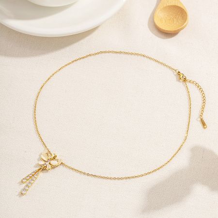 Charming gold flower pendant necklace, showcasing the variety within the stainless steel jewelry set.