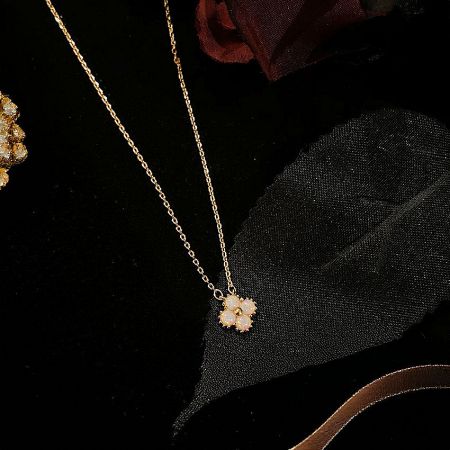 Full product view of the 925 sterling silver clover opal necklace.