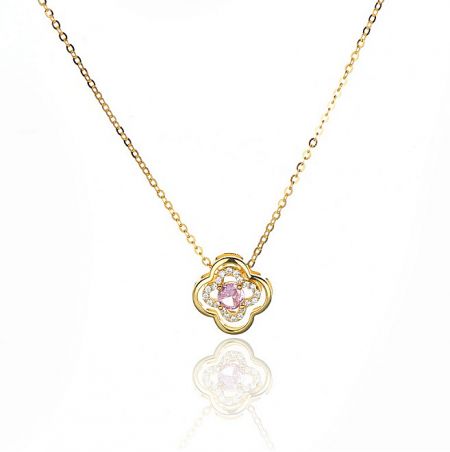 Another angle of the sterling silver clover leaf necklace with gold plating.