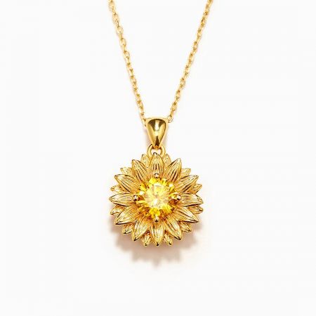 Front view of the sunflower zircon necklace, highlighting the sparkling yellow gemstone.