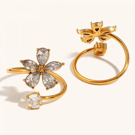 Two adjustable stainless steel flower rings with CZ stones, showcasing the elegant design.