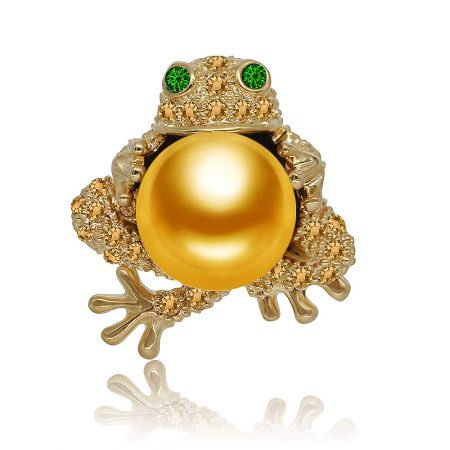 Whimsical gold frog brooch featuring a large pearl belly and green gemstone eyes.