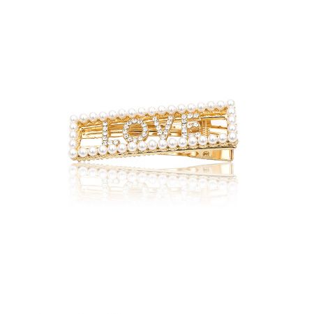Personalized Word Hair Clip - A custom gold hair clip from JR Fashion Accessories, spelling out the word 'LOVE' with inlaid crystal stones, showcasing the personalized word feature.