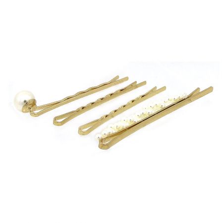 A collection of gold hair clips with various pearl designs, perfect for accessorizing.